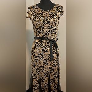 Gold over black dress